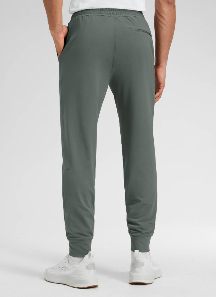 CRZ YOGA Men's Workout Casual Mid Rise Drawstring Pocket Jogger 29" Grey Sage