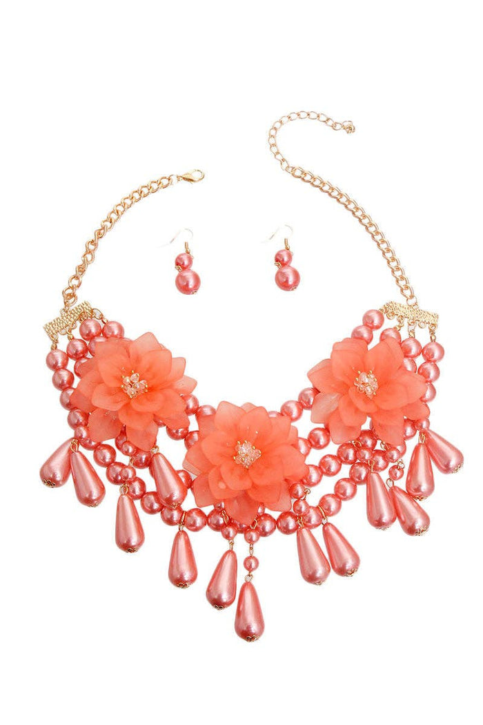 Style the Pink Pearl Teardrop Flower Set exclusively at Born To Glam