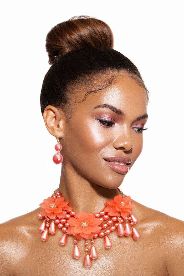 Style the Pink Pearl Teardrop Flower Set exclusively at Born To Glam