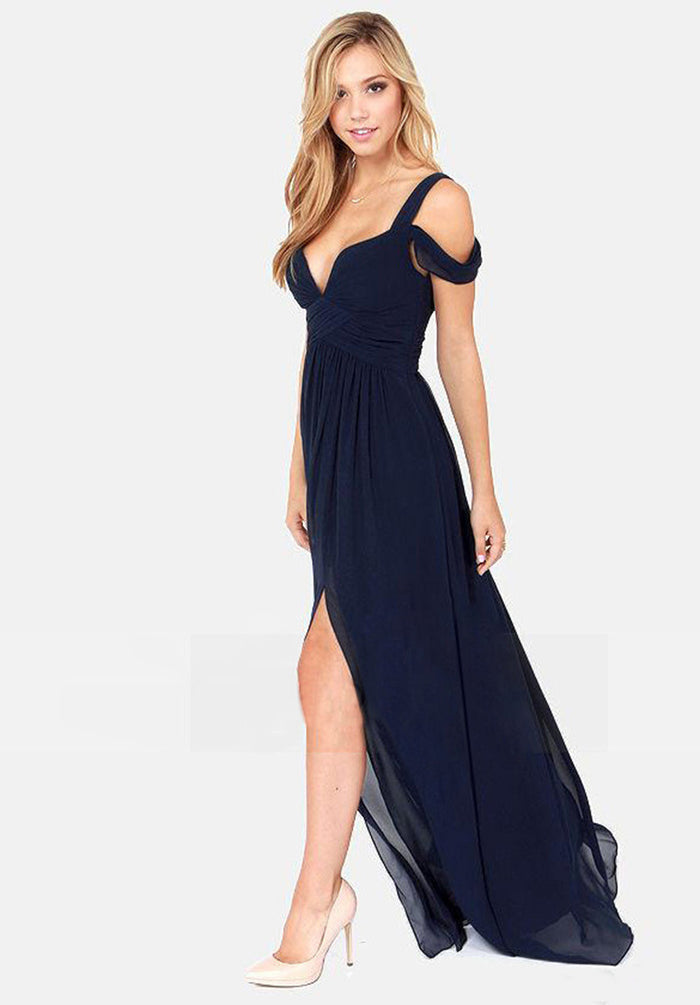 Pleated maxi dress details showing the natural waist, pleated construction and floor-length design for a closer product view.