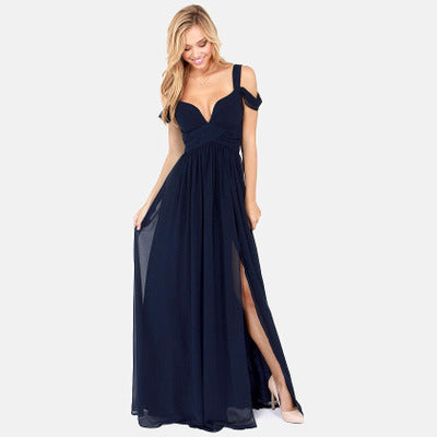 Back view of the Grecian dress, displaying the floor-length silhouette, short sleeves and pleated overall shape for shoppers.