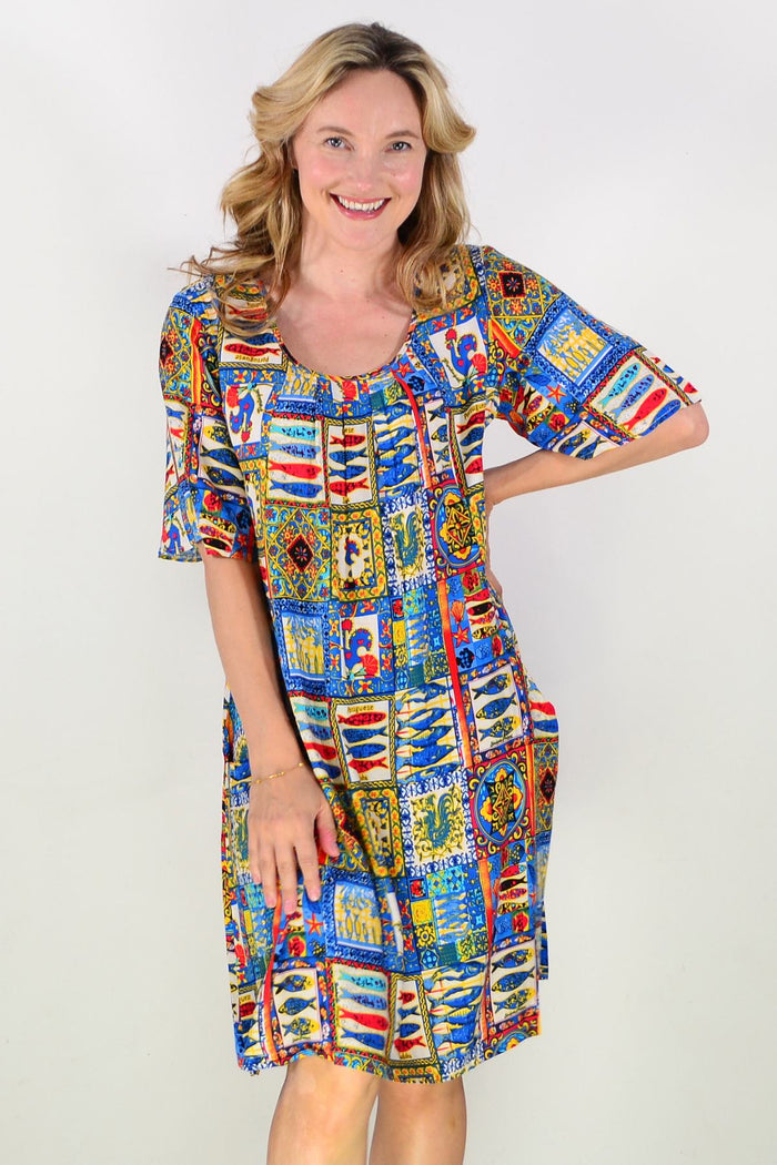 Portuguese short sleeve tunic dress by One Summer, lightweight tunic with relaxed fit, showcased on a hanger.