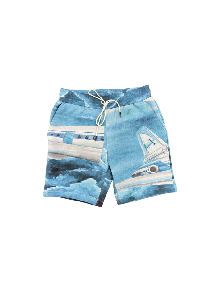Blue shorts with a boat pattern on a white background