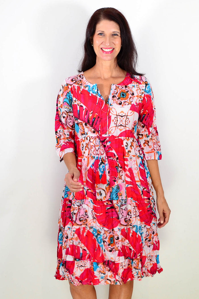 Pink Rebecca tie neck tunic dress by One Summer, featuring a relaxed fit and stylish tie detail at the neckline.