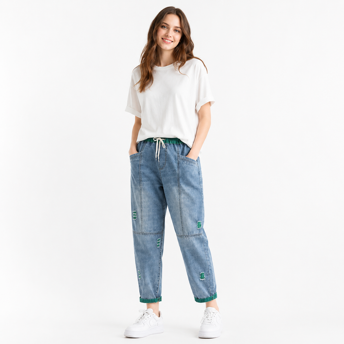 Women's ripped denim pants with cotton denim fabric, practical pockets, cropped length, and polished everyday styling.
