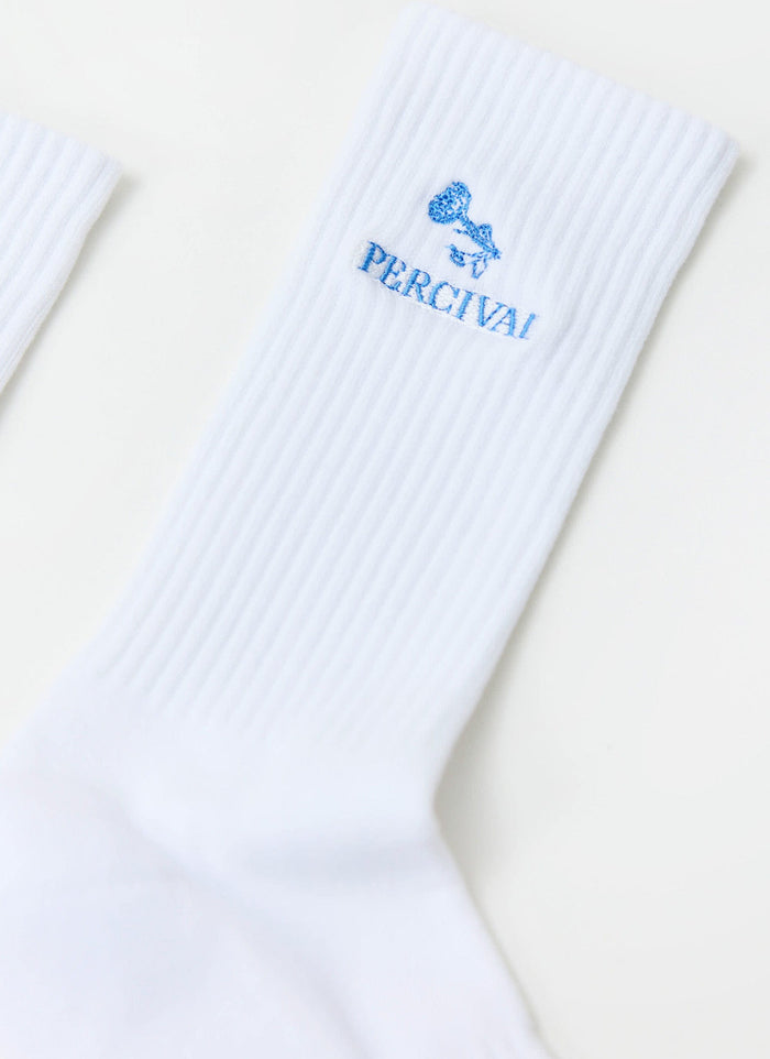Close-up of the Percival Smith Floral Embroidered Socks in white, showing the blue logo detail on the ribbed cotton.