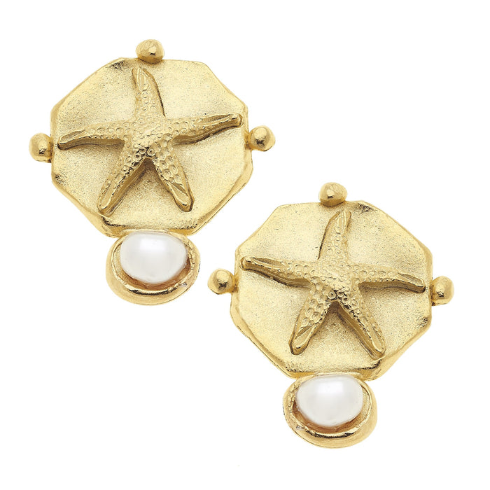 Gold earrings with starfish and pearl designs on a white background