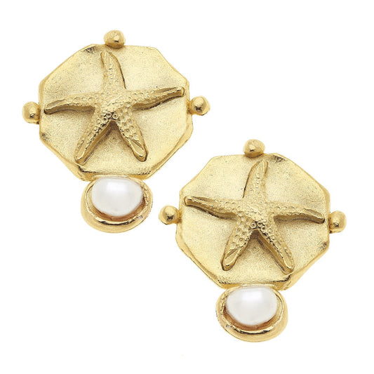 Gold earrings with starfish and pearl designs on a white background