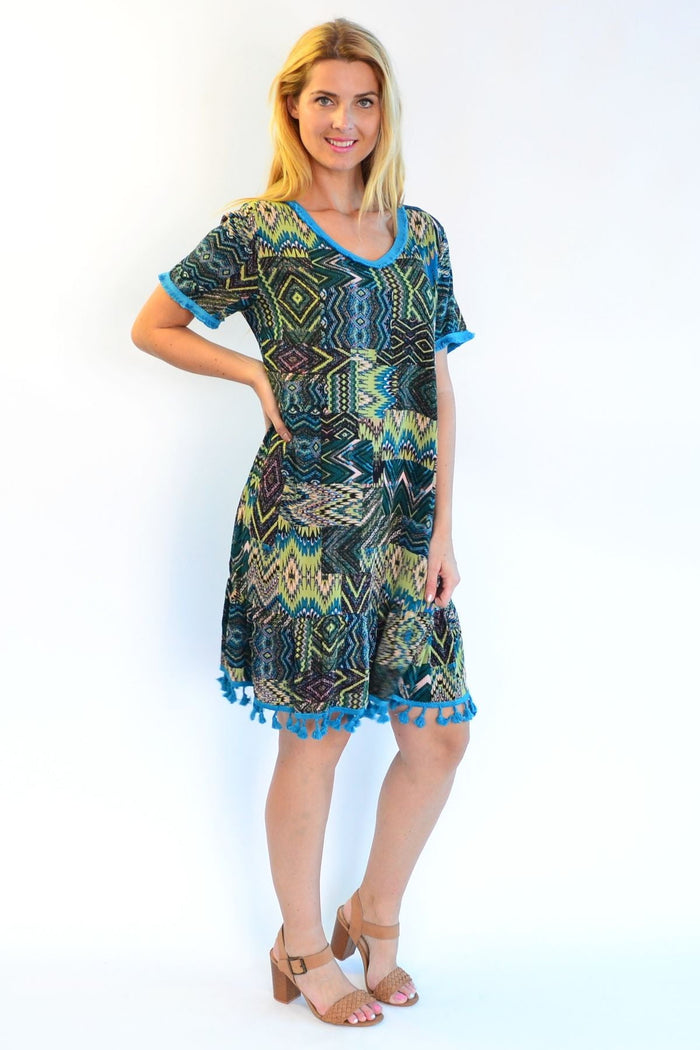 Tasseled Cha Cha Crinkle Tunic Shift Dress by Zen Garden, featuring a relaxed fit with tassel details and crinkle fabric.