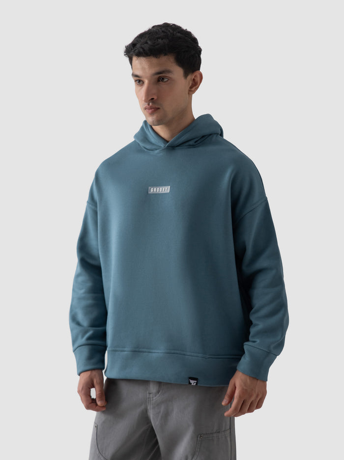 Teal blue hoodie female model front view oversized streetwear Pakistan – GROOVY