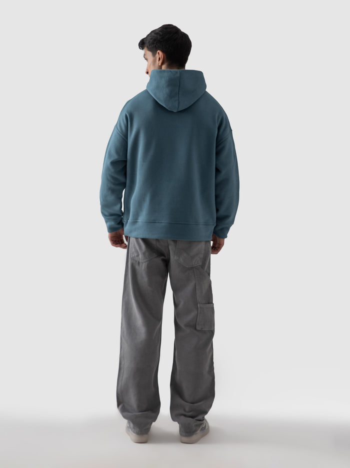 Teal blue hoodie male model back view oversized 340 GSM cotton Pakistan – GROOVY