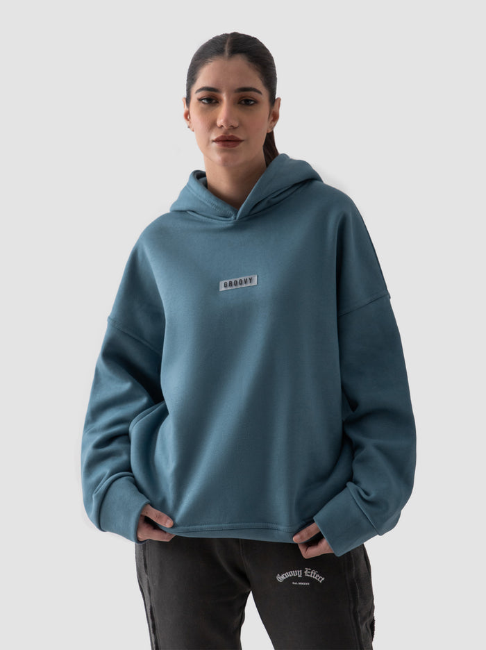 Teal blue oversized hoodie detail closeup kangaroo pocket fabric Pakistan – GROOVY