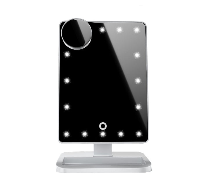 Touch screen makeup mirror on a dressing table with LED lighting, a 10X detail mirror and Bluetooth audio for daily routines.