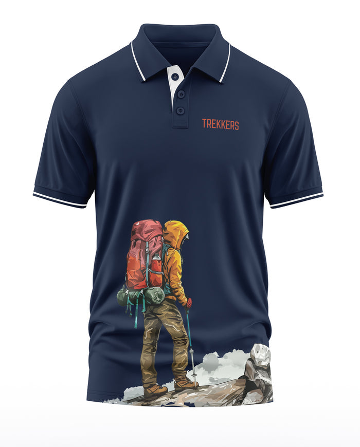 Navy blue men's polo t-shirt with trekker graphic, hiker illustration, outdoor adventure theme.