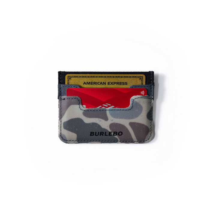 Camouflage cardholder with American Express card on a white background
