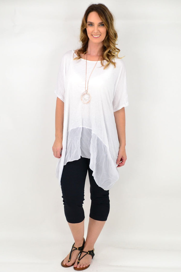 White Heron Island Tunic by I Love Tunics, lightweight white tunic with a relaxed fit and subtle island-inspired details.
