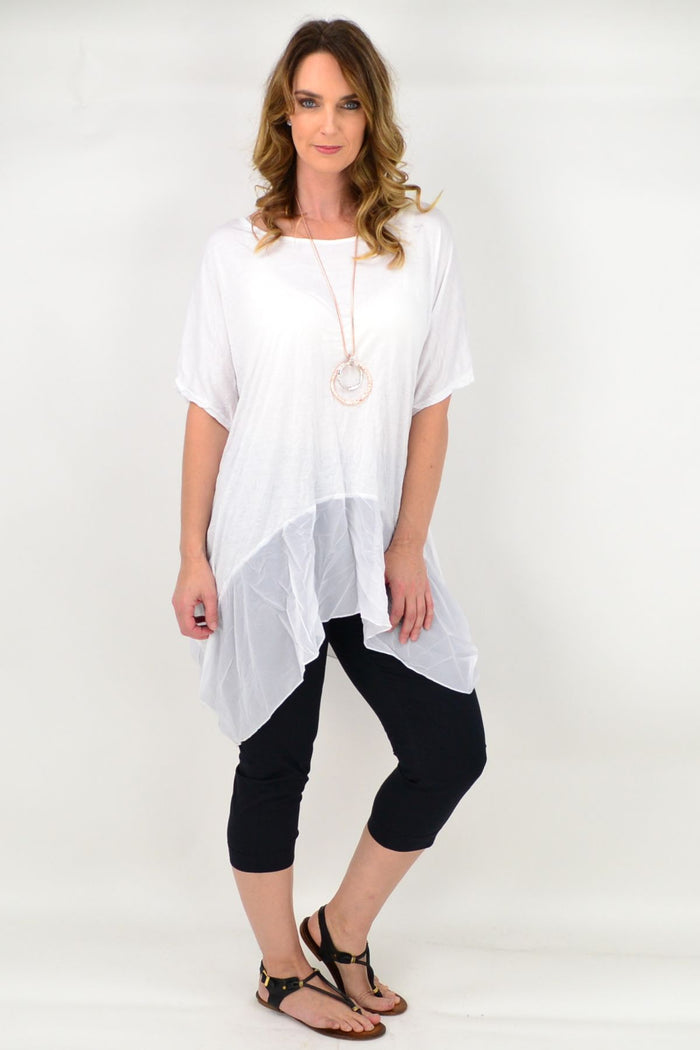 White Heron Island Tunic by I Love Tunics, lightweight sleeveless tunic with a relaxed fit and tropical island print.