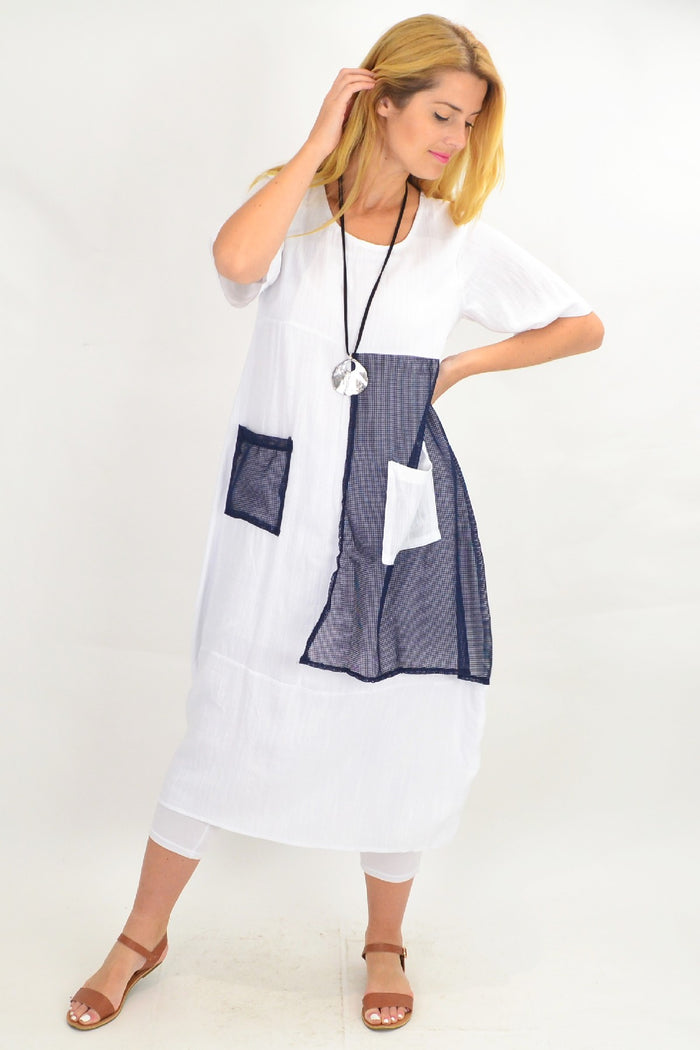 White linen blend net pocket tunic dress by Willow Tree, featuring a relaxed fit and stylish pocket detail, displayed on a mannequin.