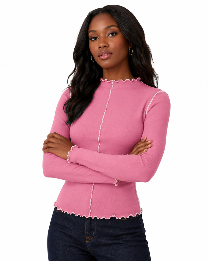 Women's casual long sleeve top showing contrast stitching, slim fit shaping and wavy lettuce trim in a detailed product view.