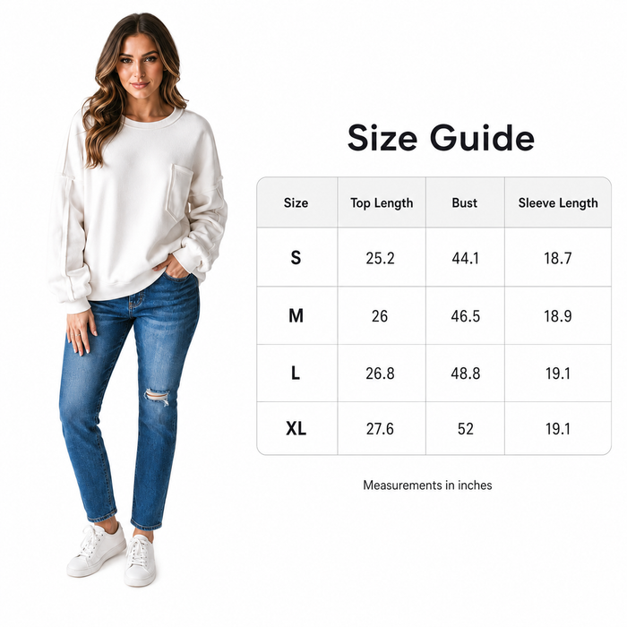 White exposed seam top for women with practical front pockets, relaxed fit and clean everyday wardrobe styling for work days.